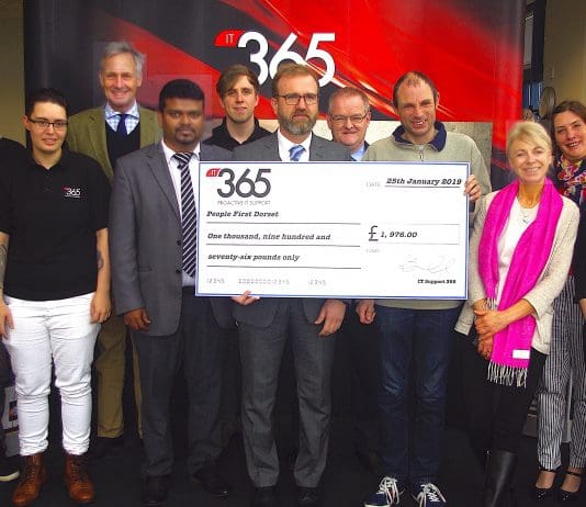 Richard Drax MP hands over charity cheque