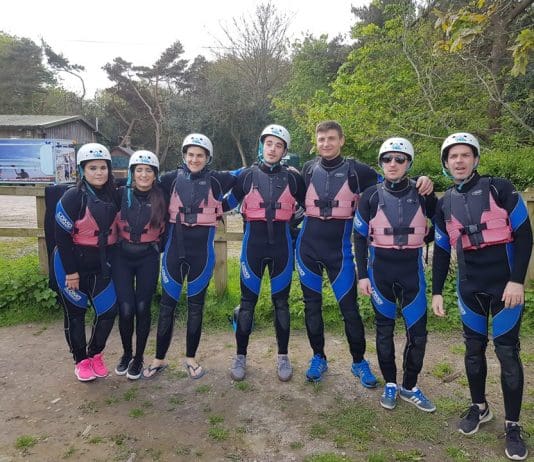 New partnership builds team spirit at Knoll House Hotel Team from Knoll House Hotel before kayaking with ForeAdventure