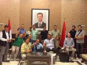 European delegation in support of Assad, containing members of the extreme right, Zenit, Casa Pound, Stato e Potenza, Fascisti del III Milennio, Partito dei Comunisti Italiani. When Black and Red go to Bed together. 