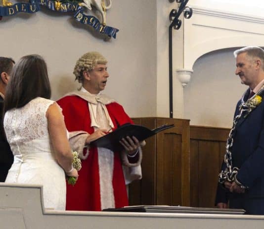 Confetti in the courtroom: couple exchange vows in historic courtroom