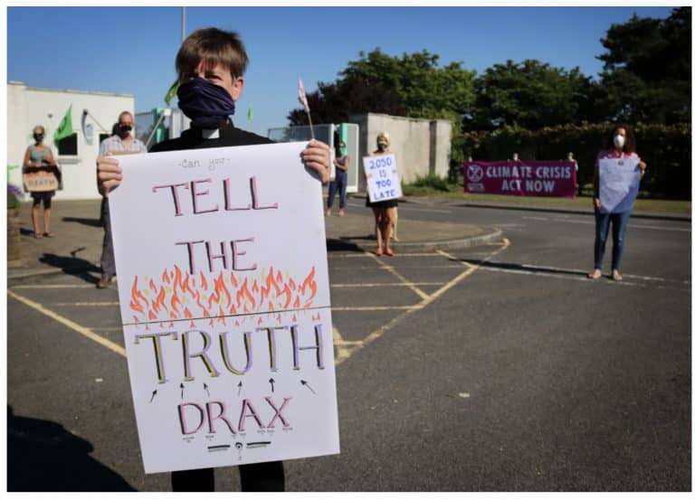 EXTINCTION REBELLION DELIVER LETTER DEMANDING CLIMATE ACTION TO RICHARD DRAX MP AS PART OF MASS-COORDINATED UK CAMPAIGN