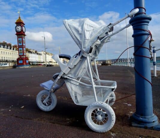 Pedestrians along Weymouth Esplanade and in Dorchester town centre were today mystified by the sight of a ghostly white buggy