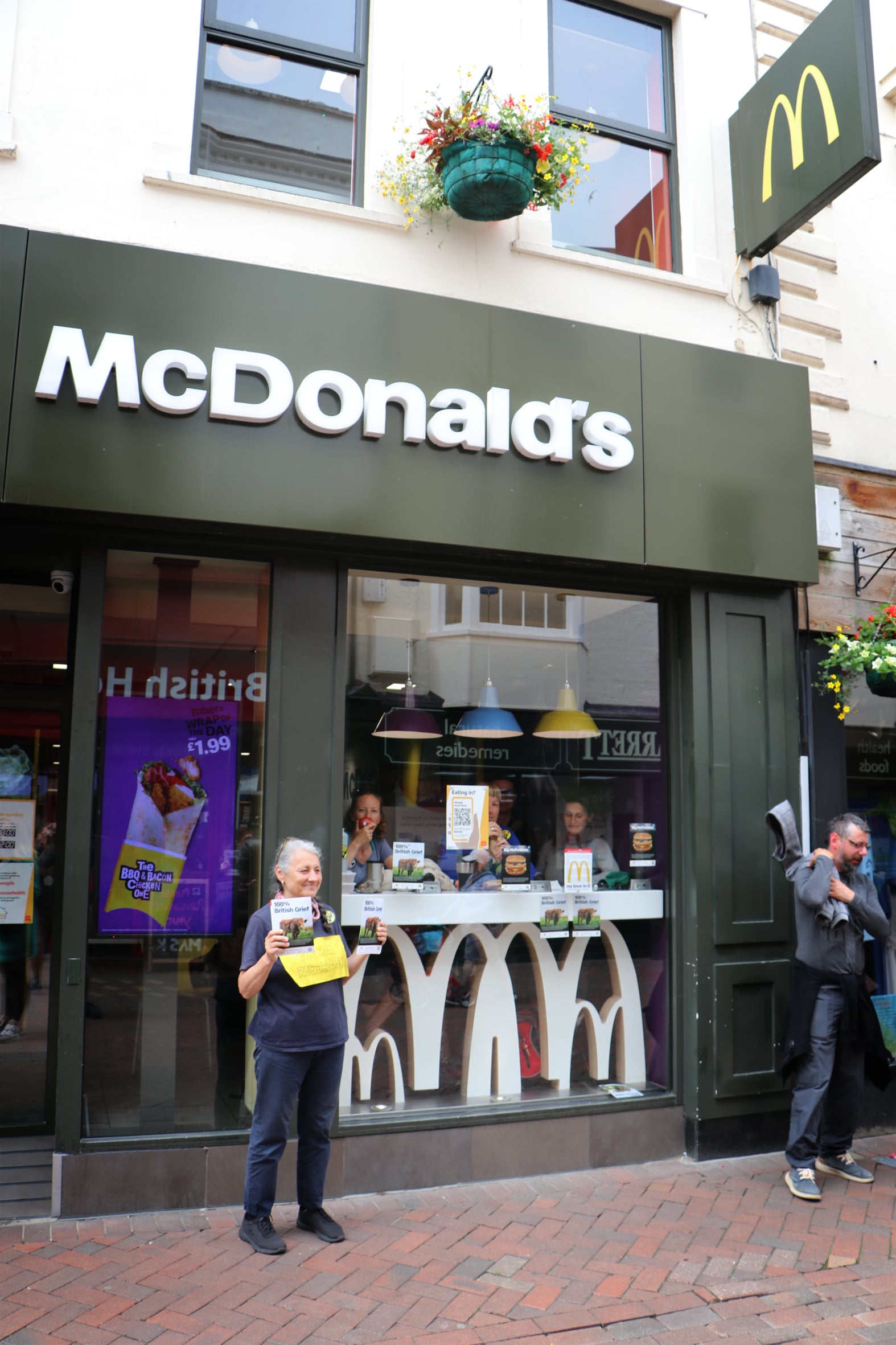 Climate activists hold a sitin protest at Weymouth McDonald’s