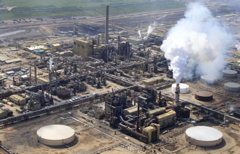 Fossil fuel companies suing tax payers across the world for trying to save the planet