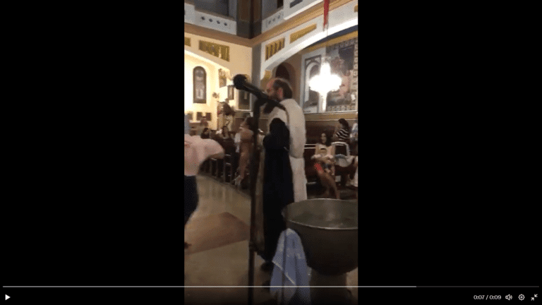 This is one p***ed off priest