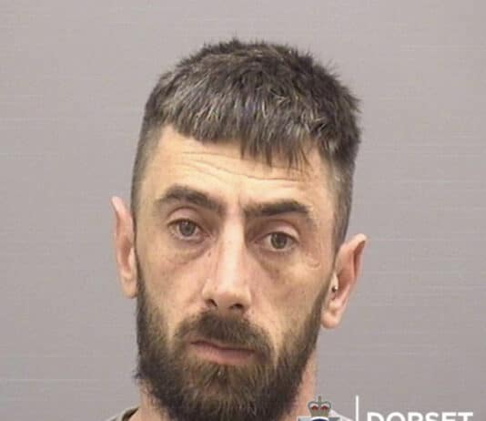 A man who robbed a Wimborne store at knifepoint has been jailed