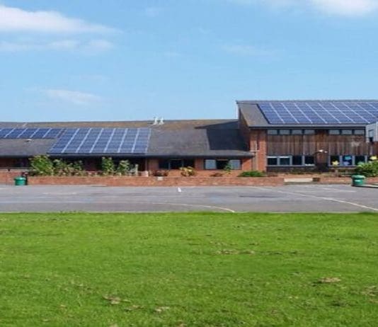 Man and boy beaten up outside of school