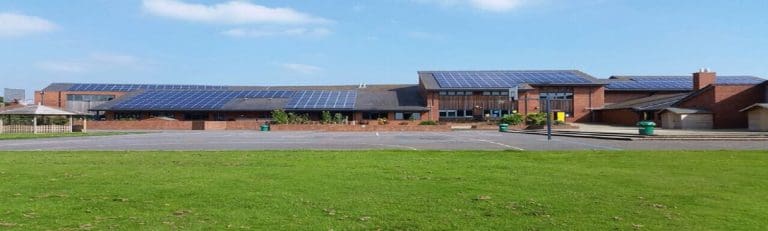 Man and boy beaten up outside of school