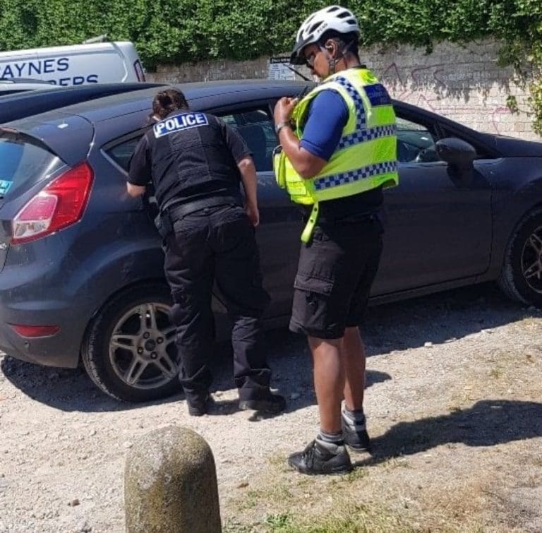 Police warn public that they will break in to vehicles in which pets are trapped in the heat