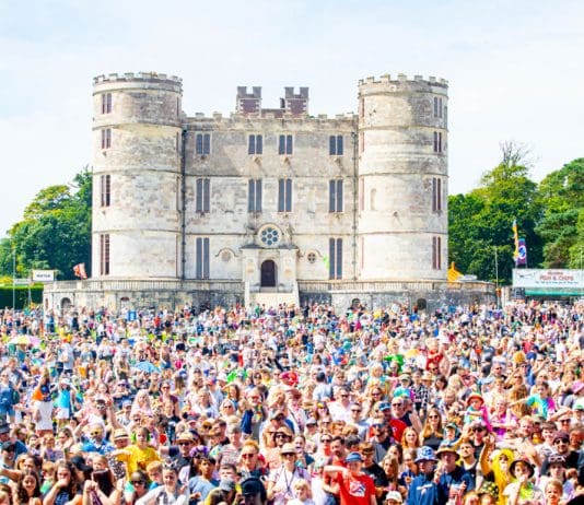 Sun-filled second day of Camp Bestival sees families of all ages celebrating in the fields of DorsetÂ