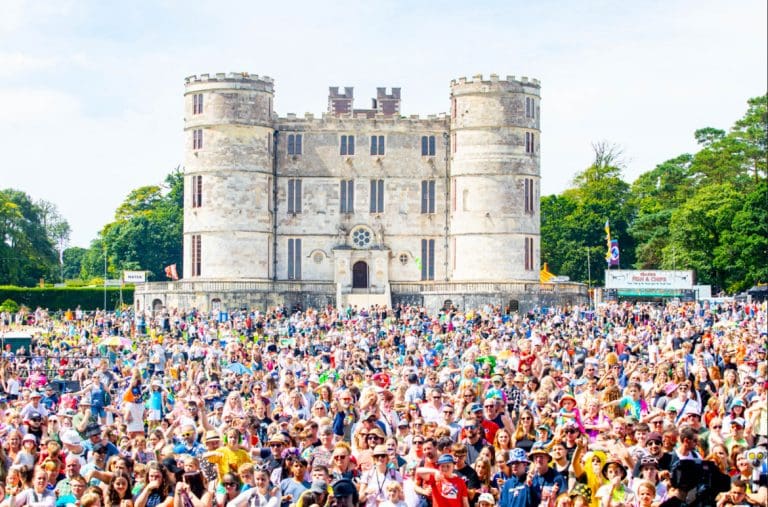 Sun-filled second day of Camp Bestival sees families of all ages celebrating in the fields of Dorset 